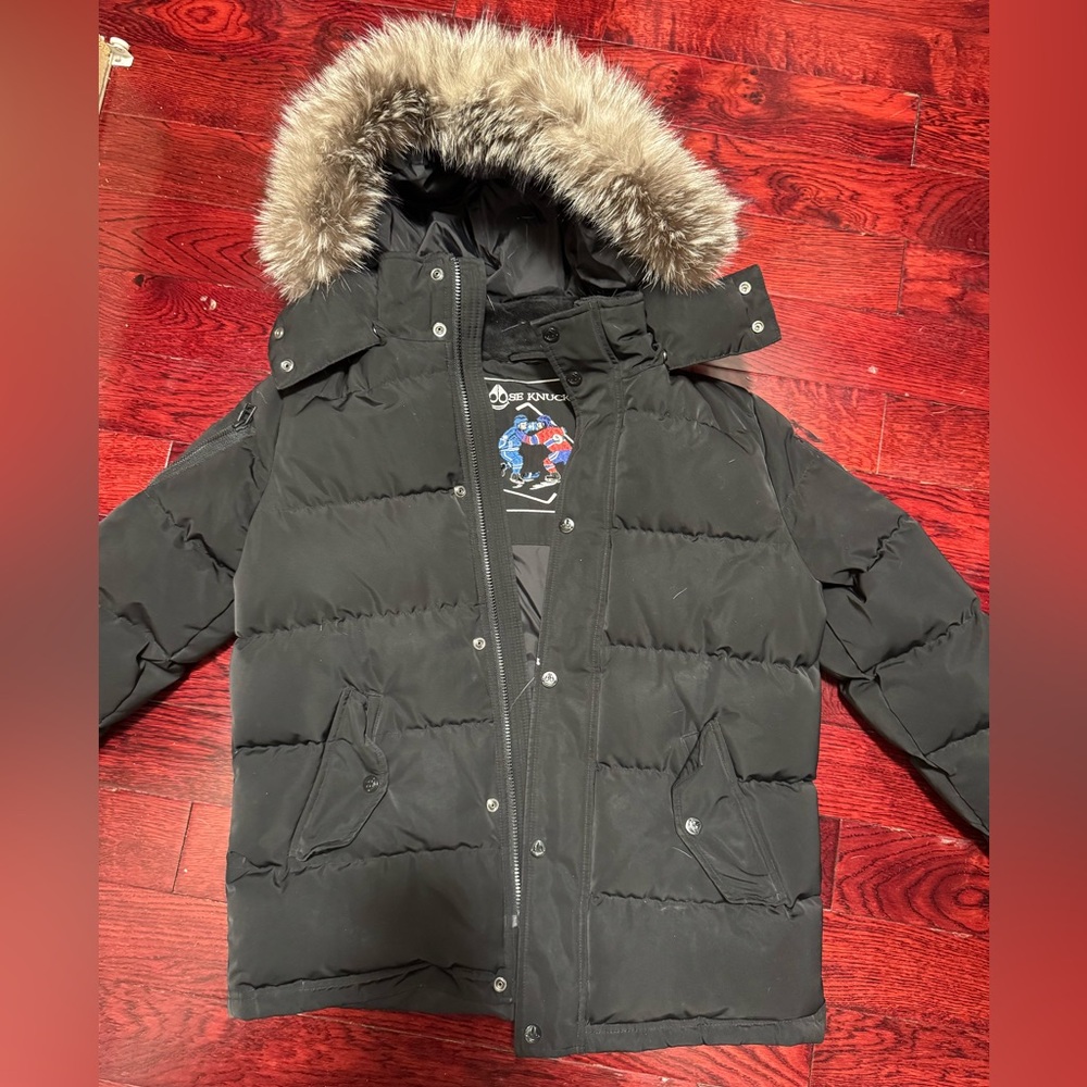 Moose Knuckles Black Jacket with Embroidered Hockey Design